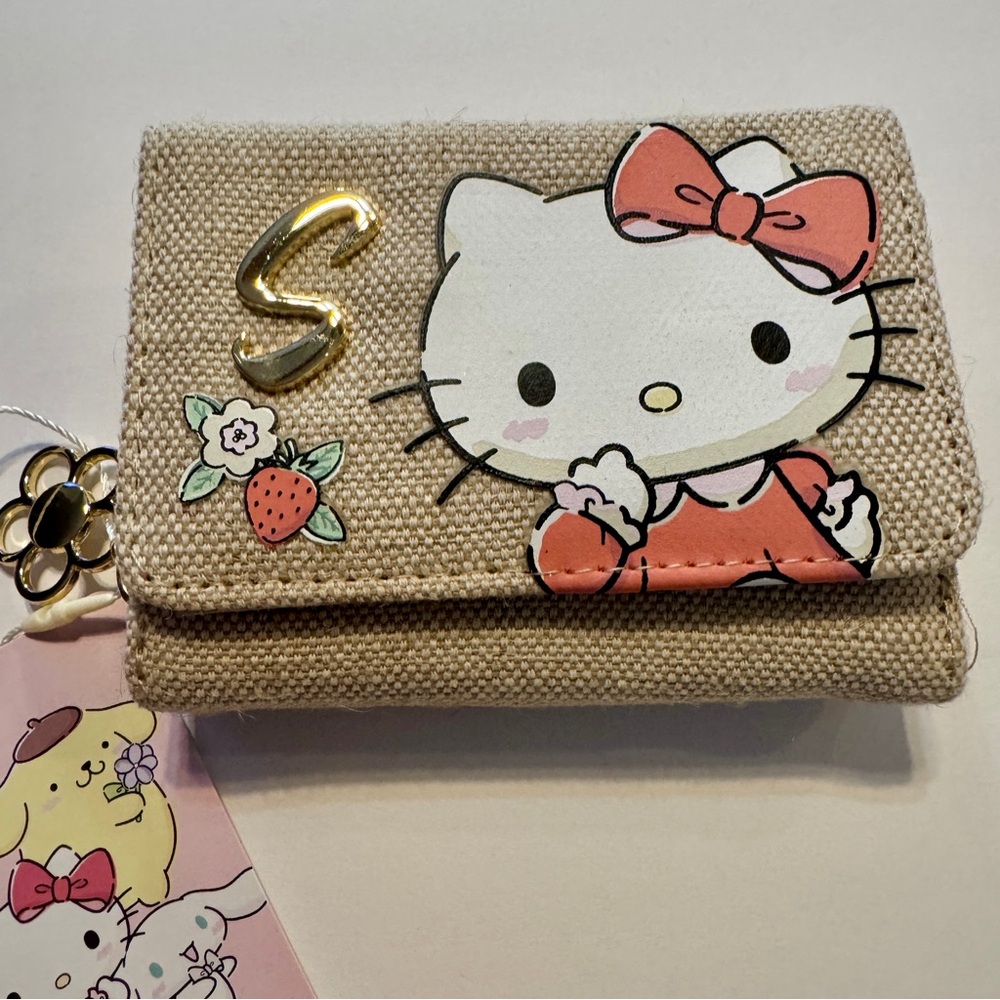NWT. Primark x Sanrio Hello Kitty Wallet with initial “S” on the front.